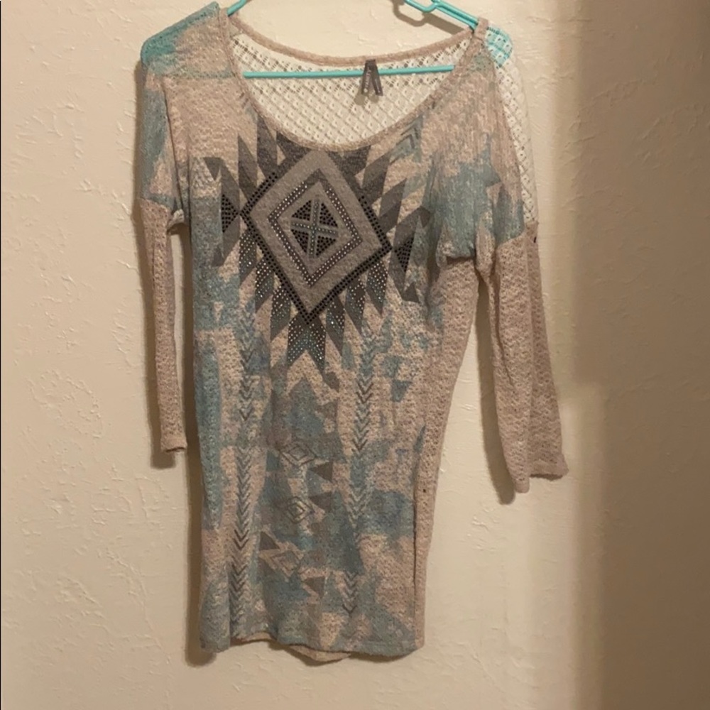 3/4 sleeve top with lace detail on the back